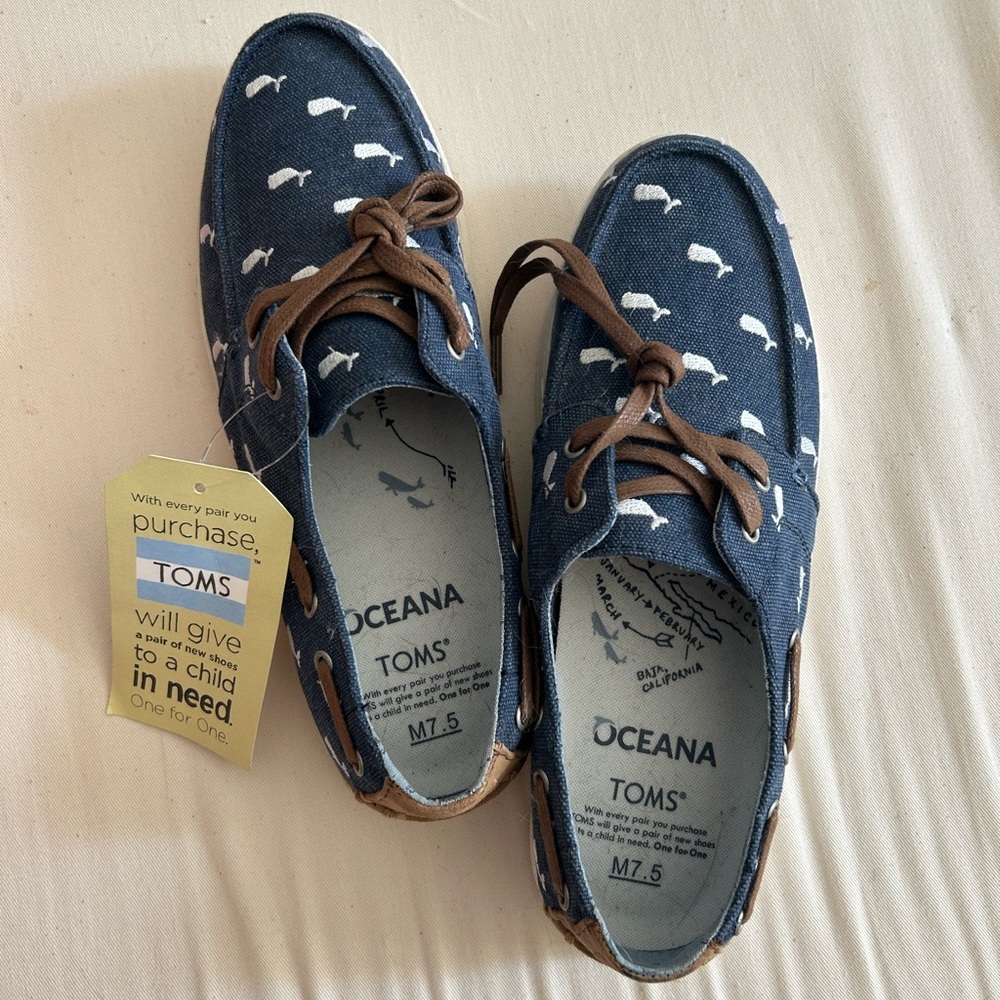 Tom’s navy boat shoes
